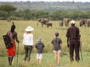 Meet your Maasai guide for a family safari to the Maasai Mara.